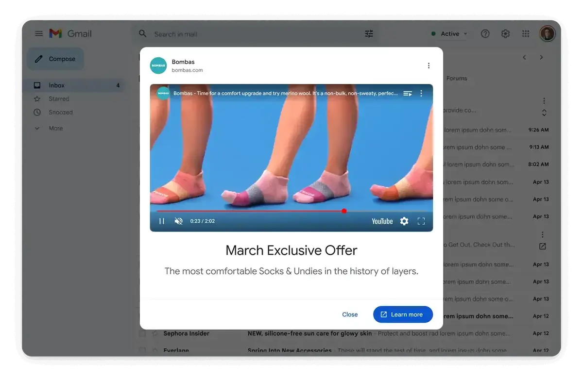Click-to-open video ad modal over the inbox